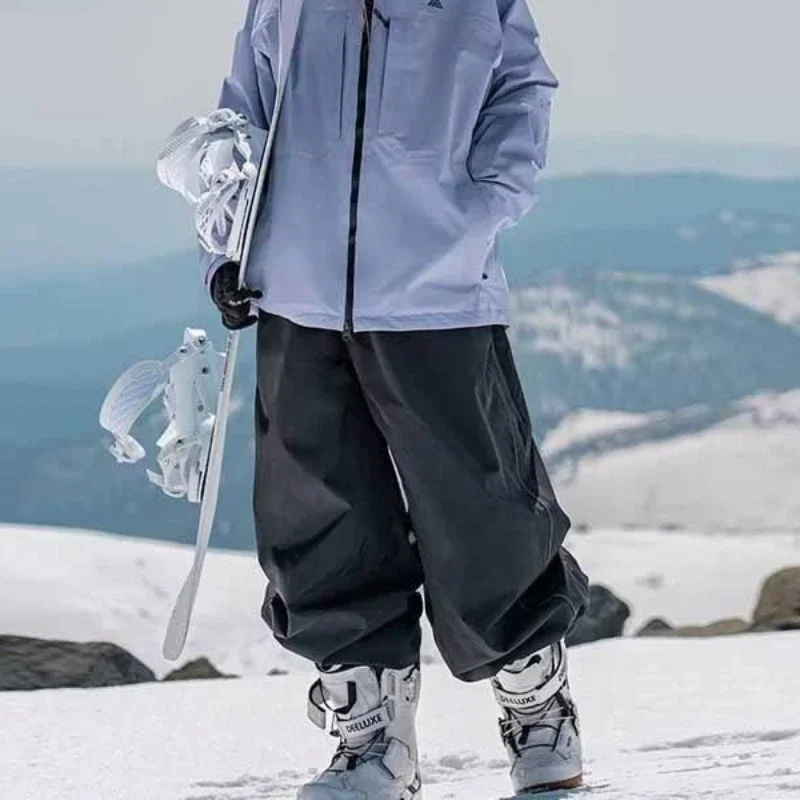 Pantaloni da sci professionali a doppia tavola da uomo e da donna, impermeabili, vestibilità ampia, resistenti all\'usura, da snowboard