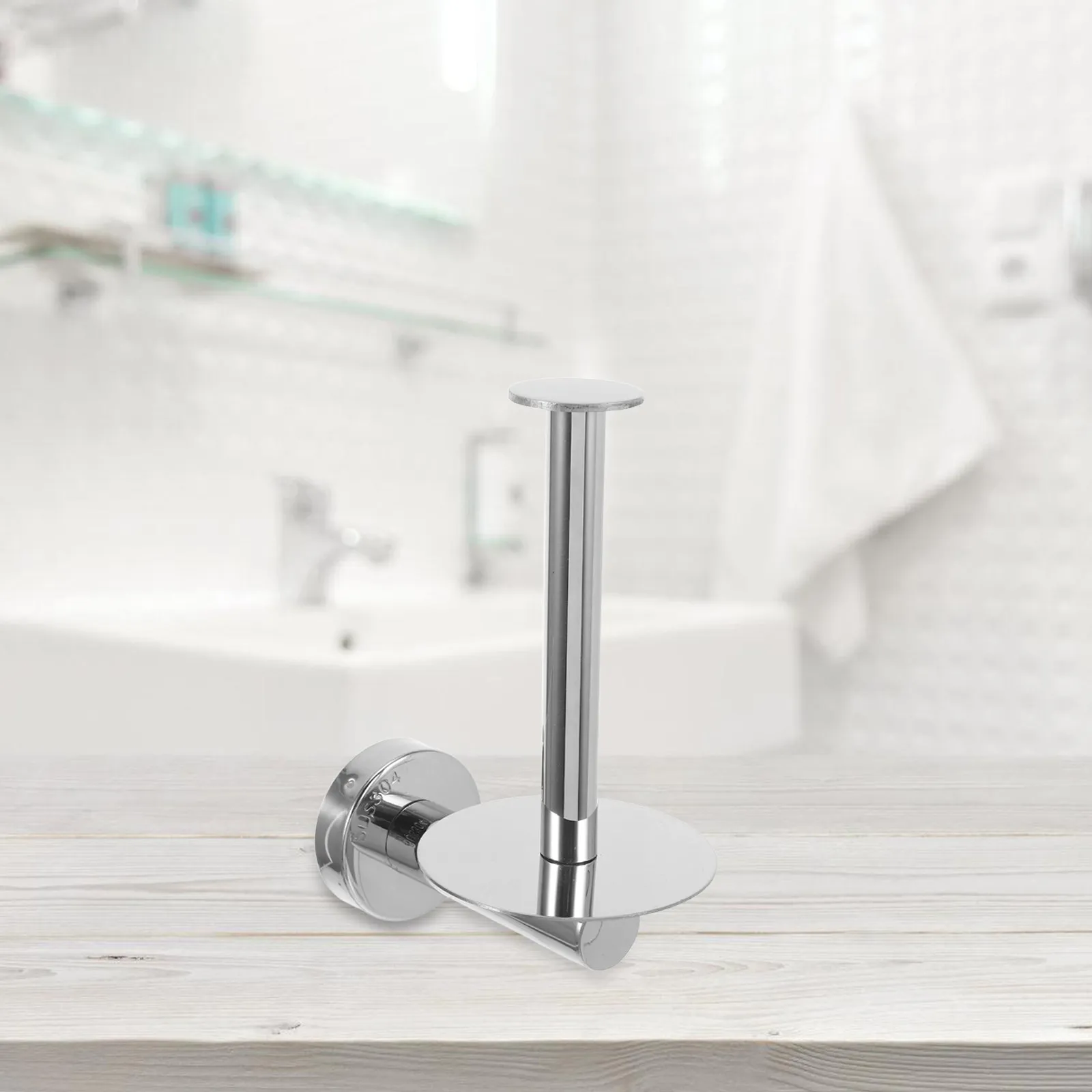 

Прочный держатель для туалетной бумаги из полированной нержавеющей стали с рычажным механизмом для установки на столешницу или на стену.