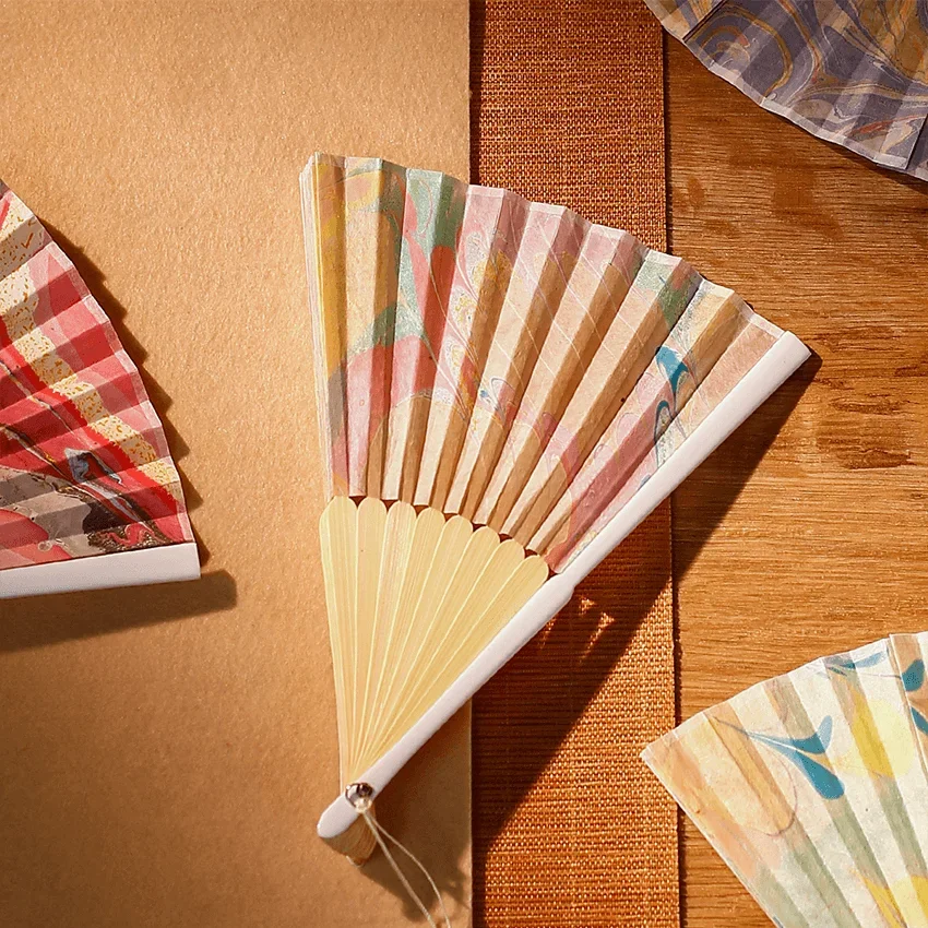 6 inch rice paper folding fan Intangible Cultural Heritage innovation China Fengtengchong handmade leather paper craft fan