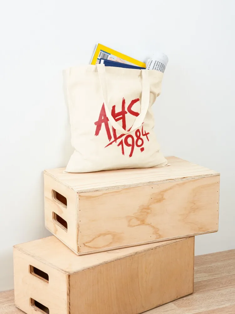 AHS: 1984 Logo Tote Bag Handbags reusable grocery bags tote bag university shopping bag logo