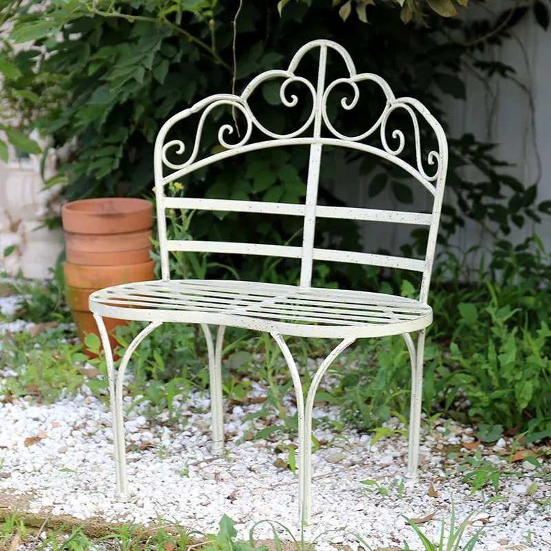 Vintage wrought iron small flower pot chair flower stool flower rack balcony park chair garden shop window photography