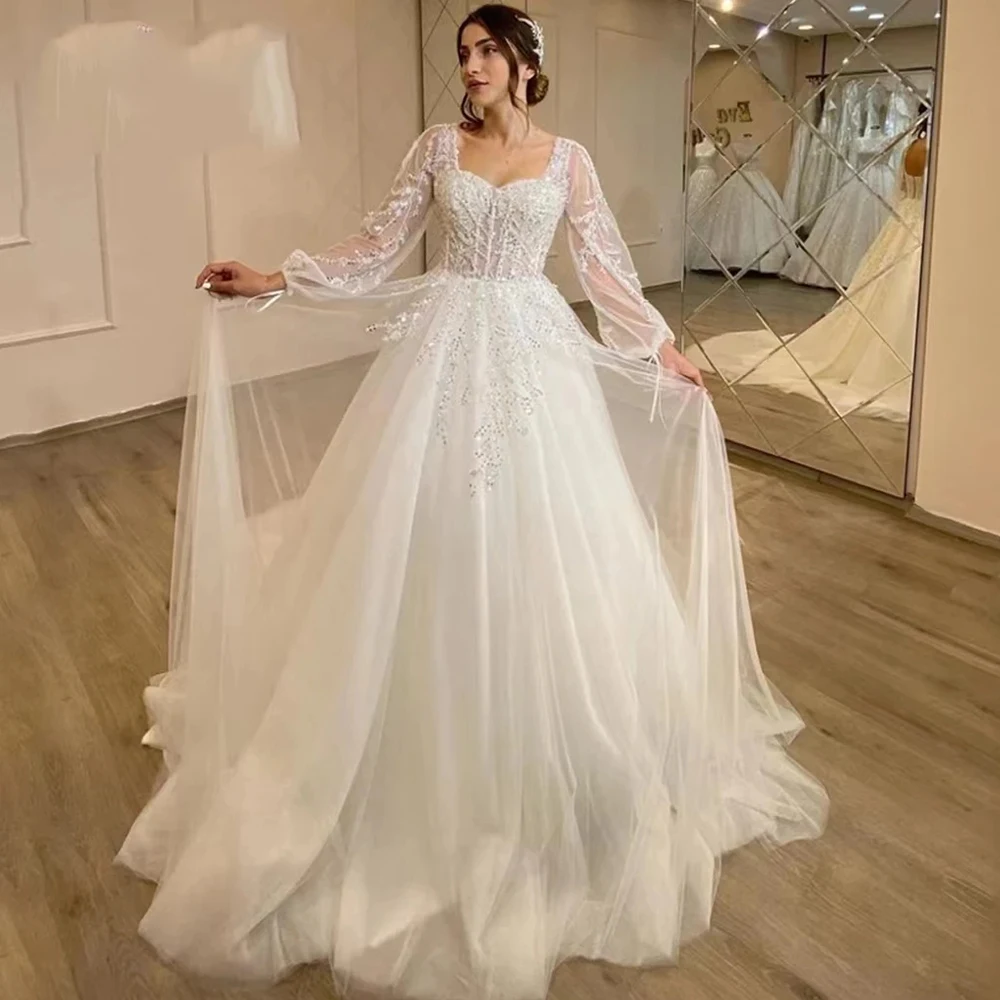 Wunderschöne, flauschige, lange Ärmel, Spitzenapplikationen, quadratischer Ausschnitt, wischende Brautkleider, weiße, faszinierende, elegante Brautkleider für Damen