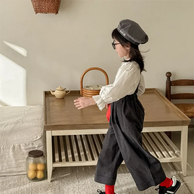 2025 ربيع ملابس الأطفال ملابس الربيع الأطفال النسخة الكورية حزام السراويل نحى تسعة سنت السراويل بنطال ذو قصة أرجل واسعة