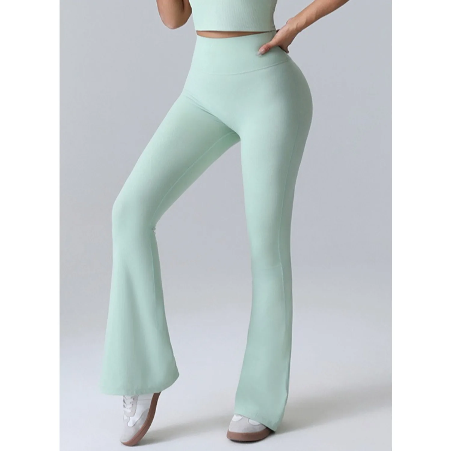 กางเกงกีฬาขายาวไร้ตะเข็บสำหรับผู้หญิง เอวสูง ยกสะโพก กระชับสัดส่วน กางเกงโยคะ ออกกำลังกาย เล่นกีฬากลางแจ้ง กางเกงทรงบาน