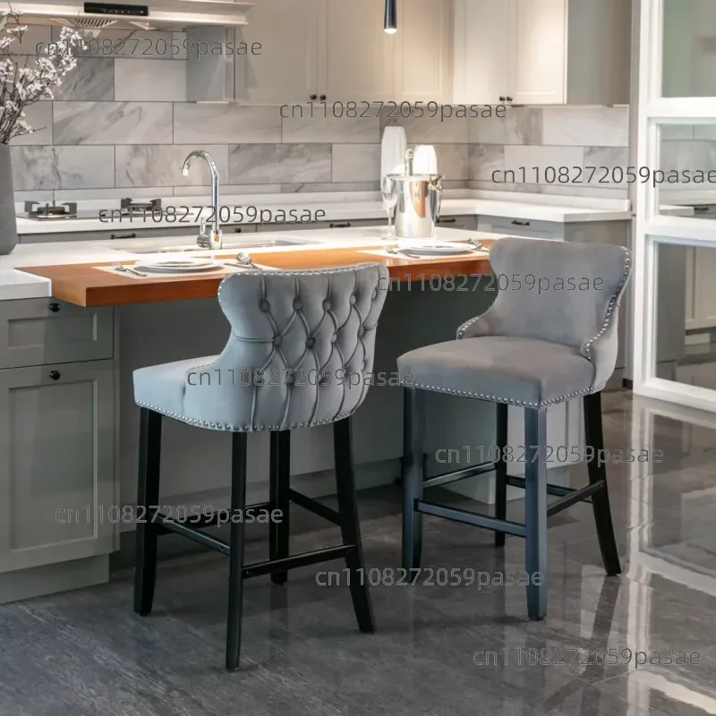 Contemporary velvet upholstered wing-back bar stool with button tufted trim and chrome wood legs