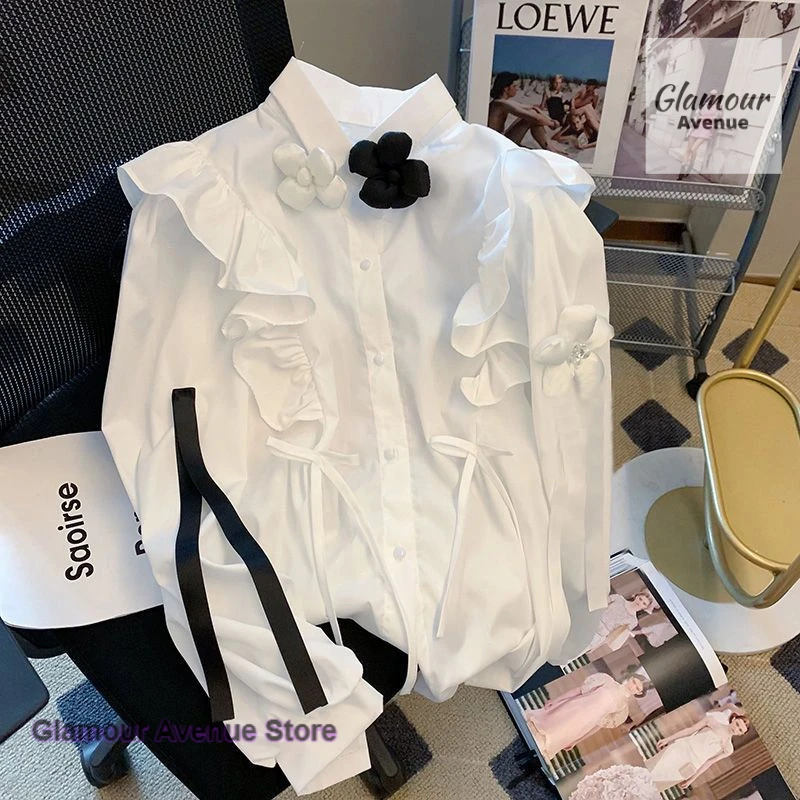 

French fashion style sexy ruffled flowers long-sleeved shirt female spring and autumn loose sweet temperament coat top.