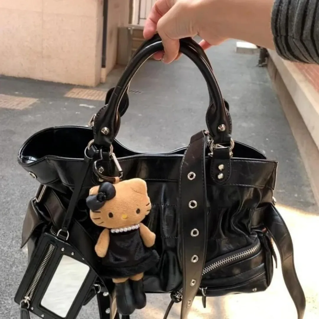 

Новая модная ретро-трендовая, хит продаж, нишевая высококачественная текстурированная женская сумка через плечо в стиле панк для поездок на работу