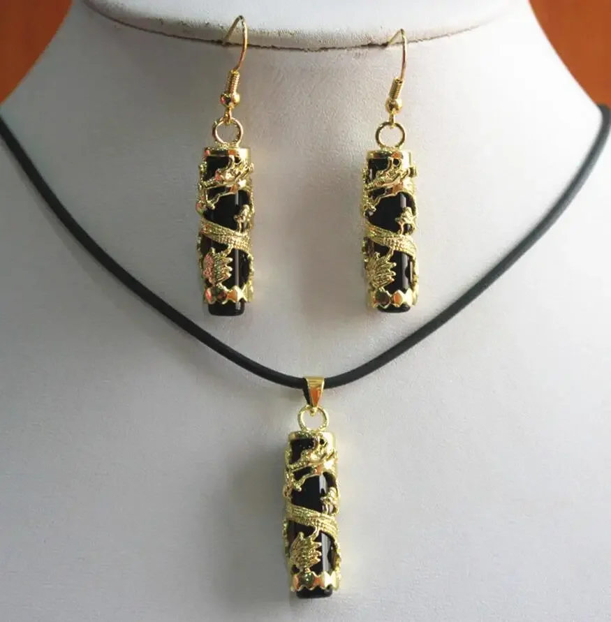 

Hot sell good wholesale/retail unique Chinese black cylinder jade pendant & earring set