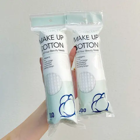 100pcs/200pcs soft and breathable round cotton pad with double-sided texture is used for daily facial cleaning and makeup remova