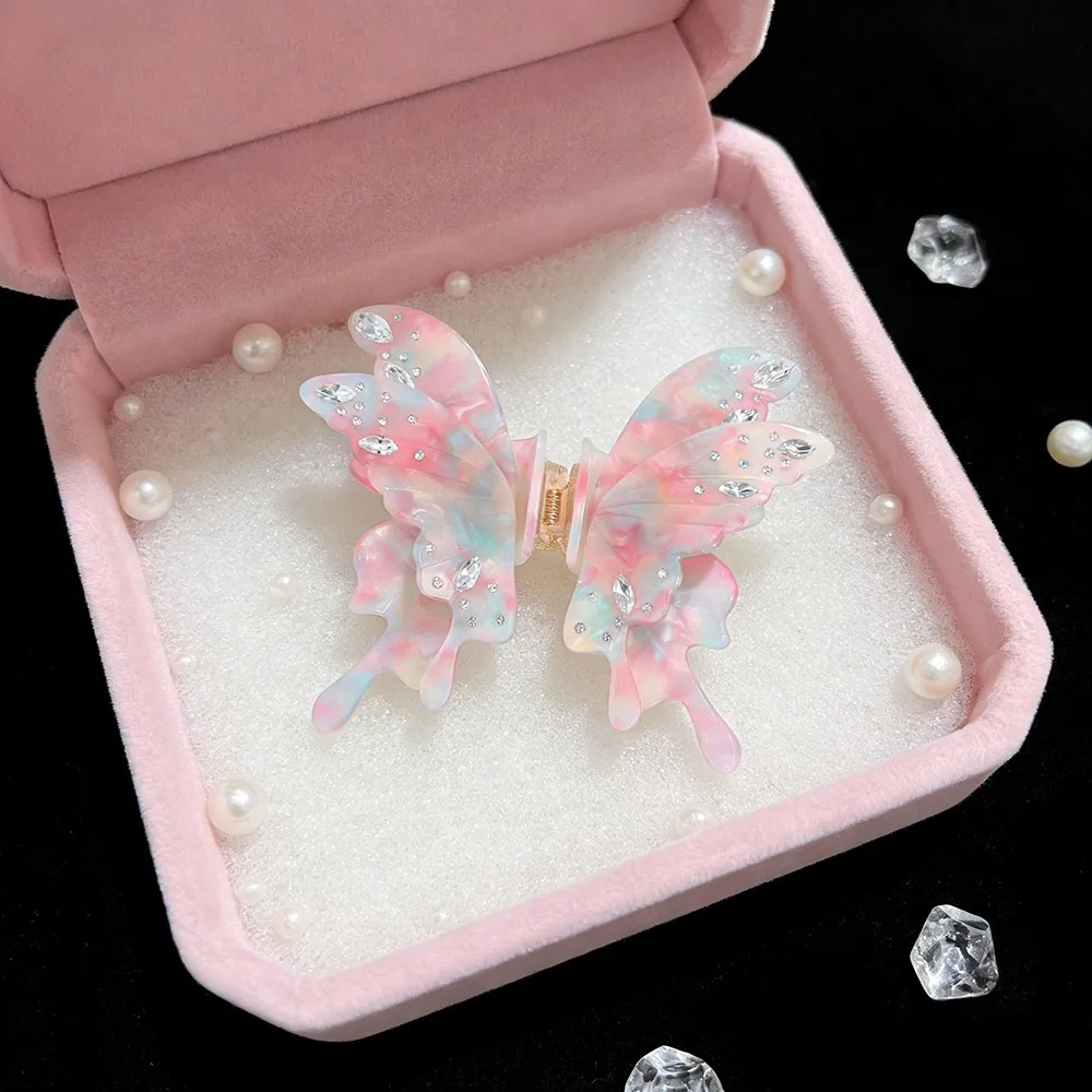 

Elegant and beautiful pink acetate butterfly hair claw, suitable for daily use and wedding party hair decoration.