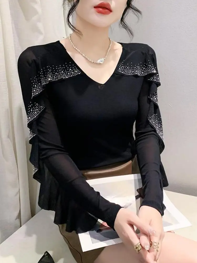 

2024 Spring Mesh Fashion Round Neck Hollow Heavy Industry Ruffle Edge Hot Rolled Diamond Versatile Long sleeved Women's Top