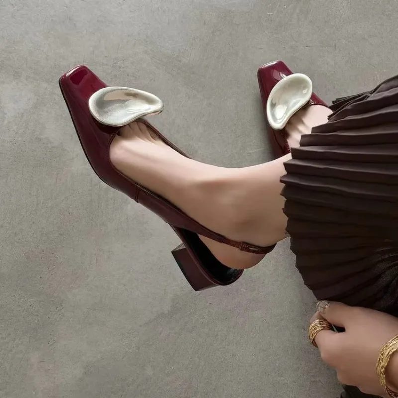 

Women's Pointed Fashion Metal Decorative Open-heeled Sandals Spring and Summer Holiday Fairy One Foot Leisure Baotou Sandals.