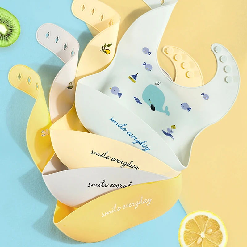 

Silicone baby bib with snap design, soft and durable, 360° rotatable design, easy to clean, perfect for feeding time