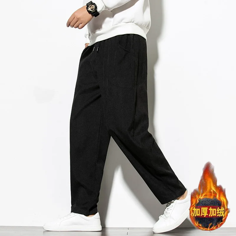 Pantaloni Harem dritti a vita media in velluto a coste tinta unita da uomo pantaloni larghi larghi a gamba larga di grandi dimensioni