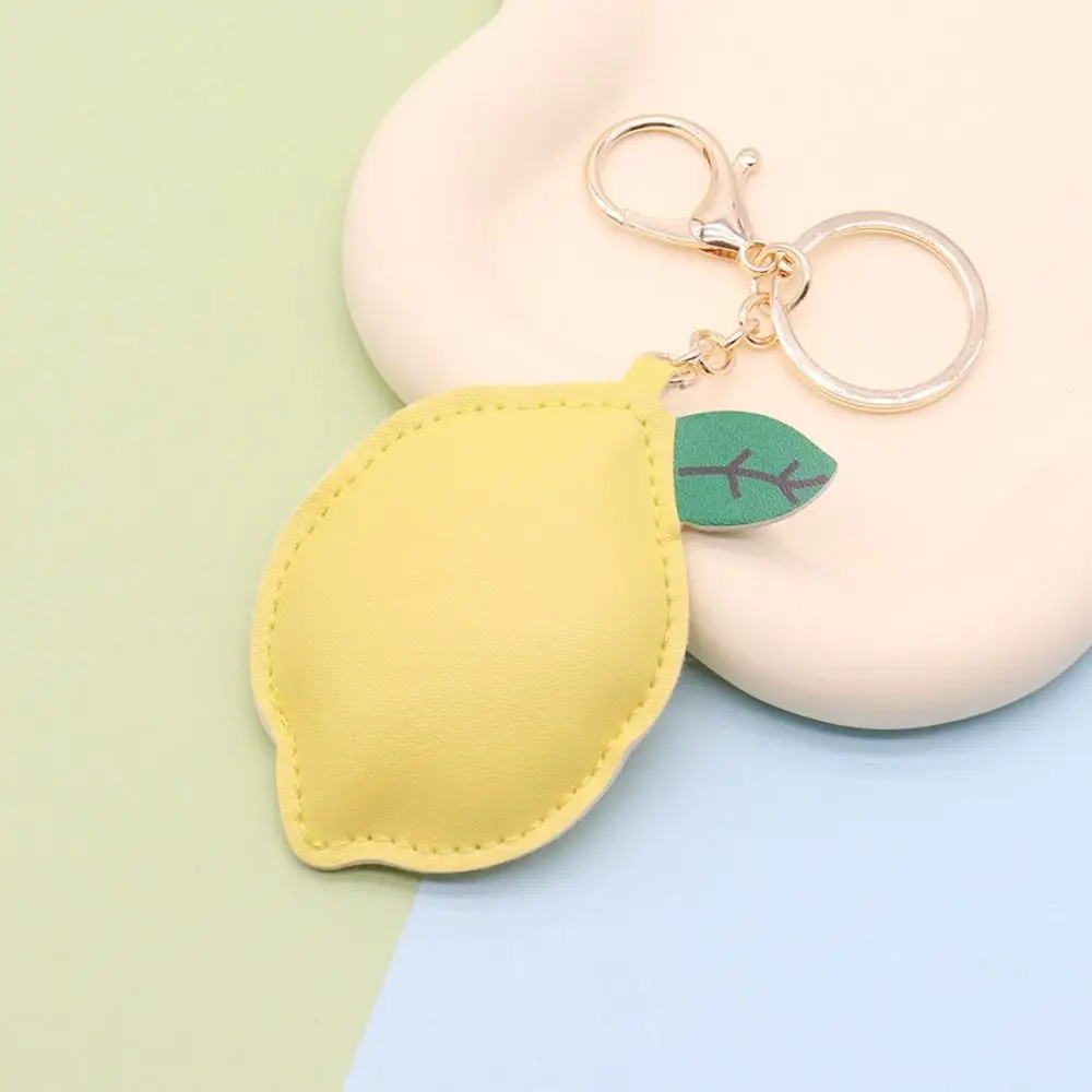 

Cute PU Leather Lemon Keychain Fruit Car Keyring PU Leather Hanger Fashion Cartoon Bag Pendant Men