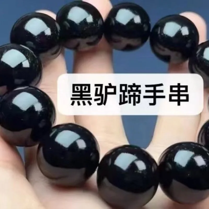 黒人男性が扱い、遊ぶのに適した、ロバの蹄の文化玩具のブレスレット、個人用の角骨。