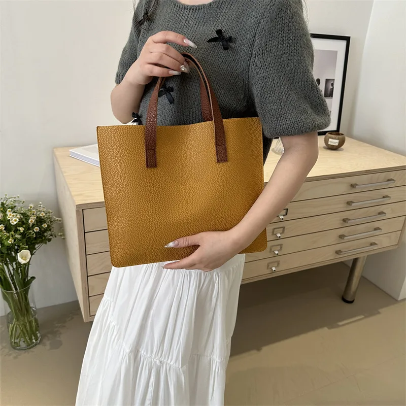 Nuova borsa Tote da donna in pelle PU borsa da donna alla moda e semplice borsa a tracolla da donna Casual di grande capacità estiva 2024