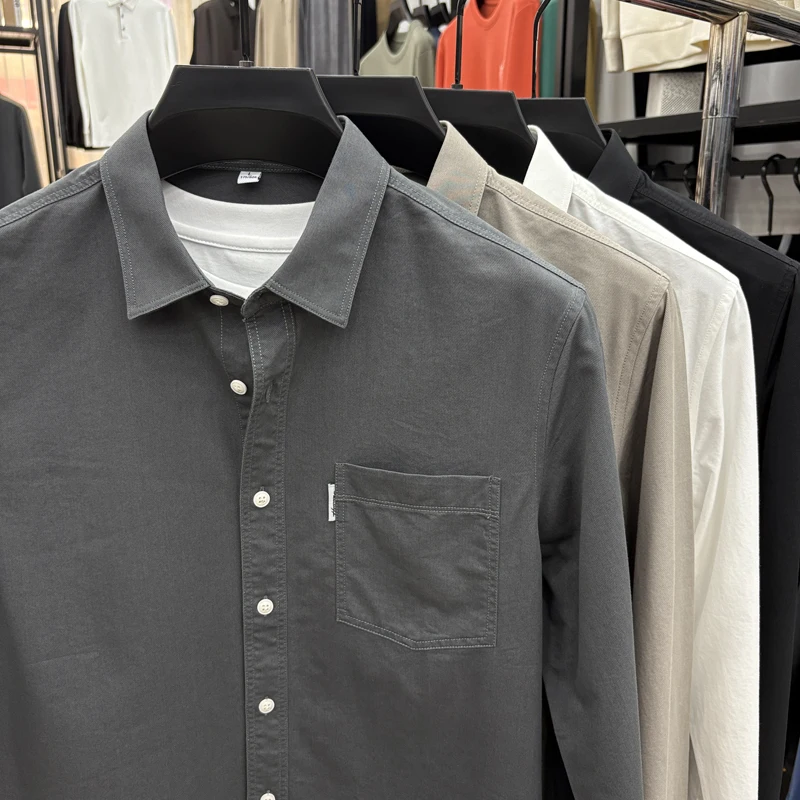 Camisa de lyocell de alta calidad de otoño para hombre, solapa de color sólido, nueva ropa de abrigo de manga larga con bolsillos, tops de moda de ocio para hombre