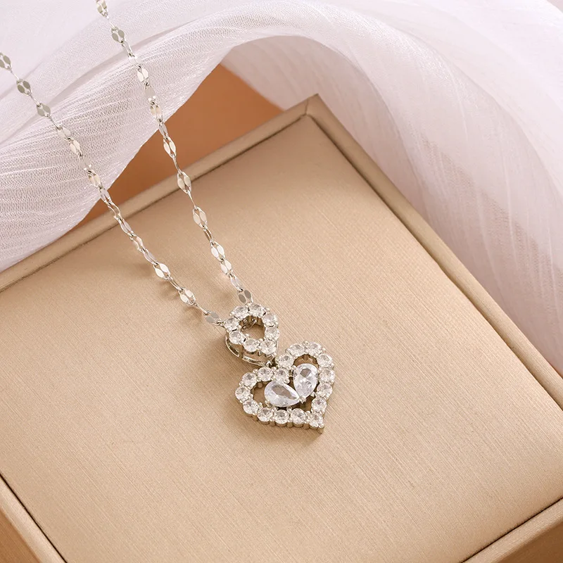 

A highly sought-after new type of heart-shaped knot pendant necklace for women, made of titanium steel and set with diamonds