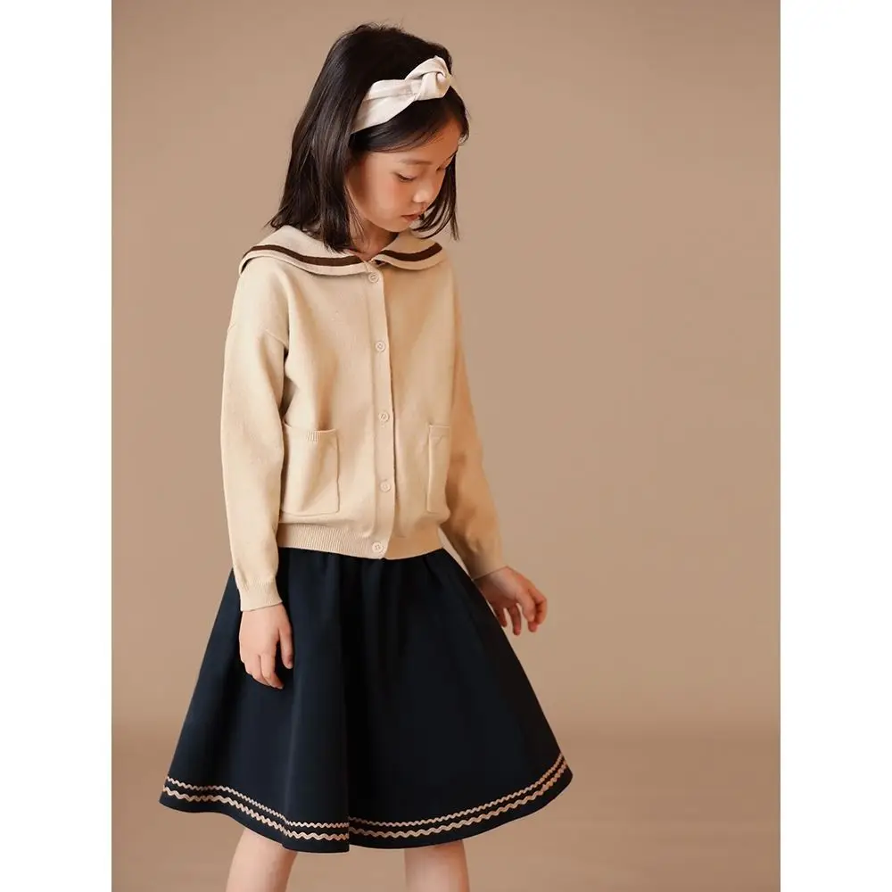 

Children's clothing autumn new products, girls' college style sweater, navy collar, color blocked pocket, cotton knit cardigan j