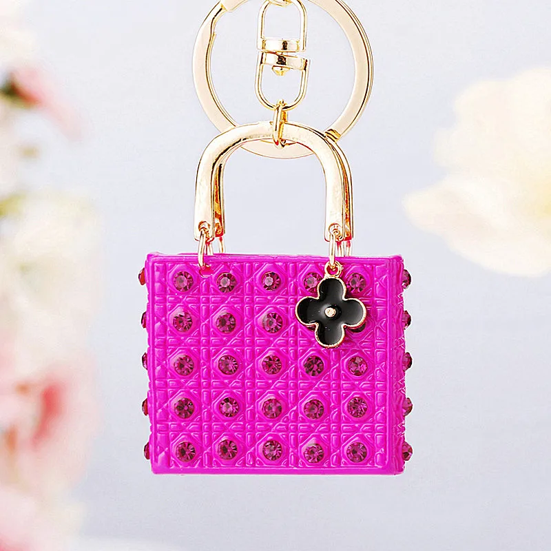 Exquisite rhinester with flower small satchel key chain women's bag pendant metal keychain.