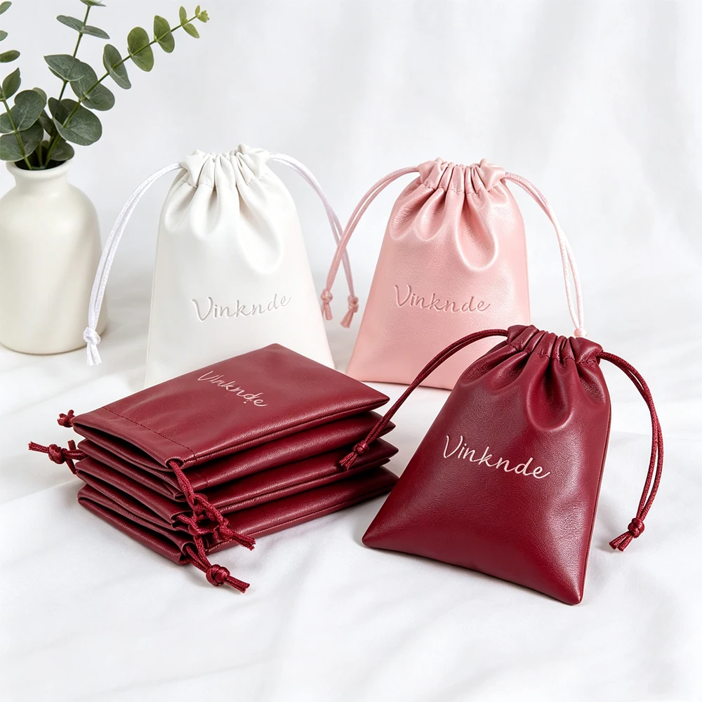 

100Pcs/Lot Luxury Pu Leather Drawstring Jewelry Bag Custom Logo Size Earring Ring Perfume Packaging Bags Waterproof Dust Pouch