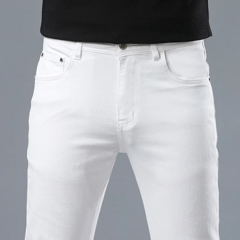 Autumn pure white jeans men's high-end and fashionable trendy casual all-matching street stretch slim-fit light luxury trousers