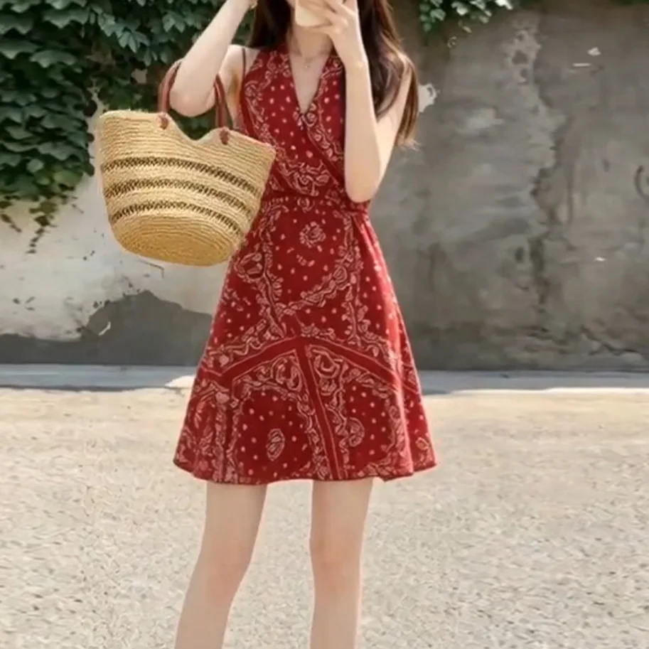 French V-neck Sleeveless Red Floral Dress Summer 2026 New Beach Vacation Style Pure Desire Short Skirt Polyester Fabric