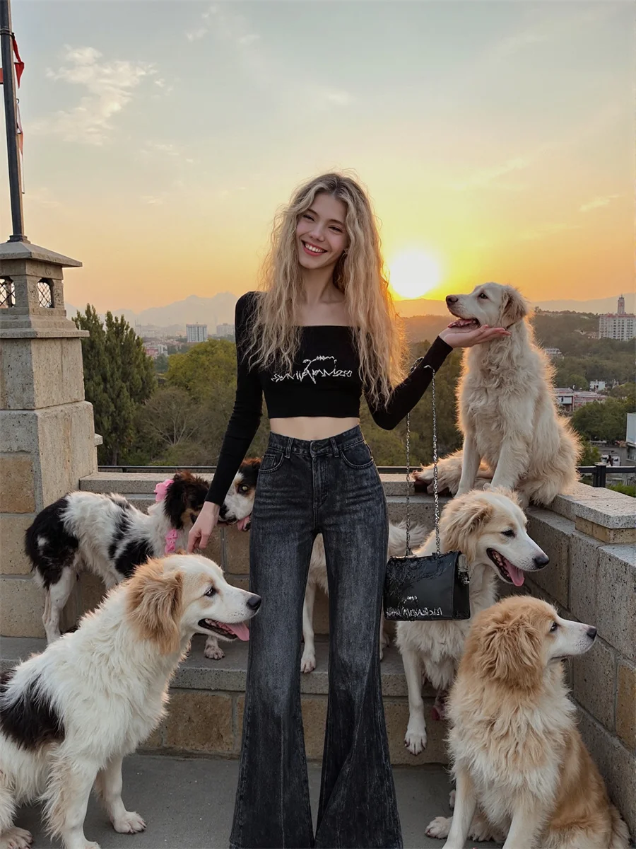 フレアダメージジーンズパンツ女性用デニム女性服リッピング穴あきボーイフレンドグラフィティワイルドヒップスターカジュアルオールマッチ