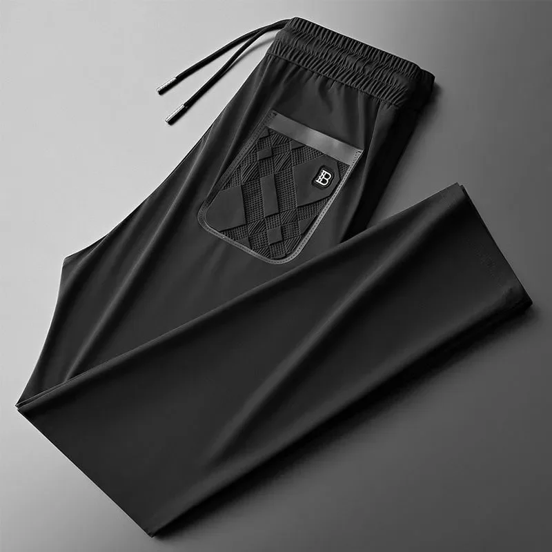 Luxury brand men's letter printed casual pants 2025 summer new ice silk comfortable and breathable casual pocket sports pants