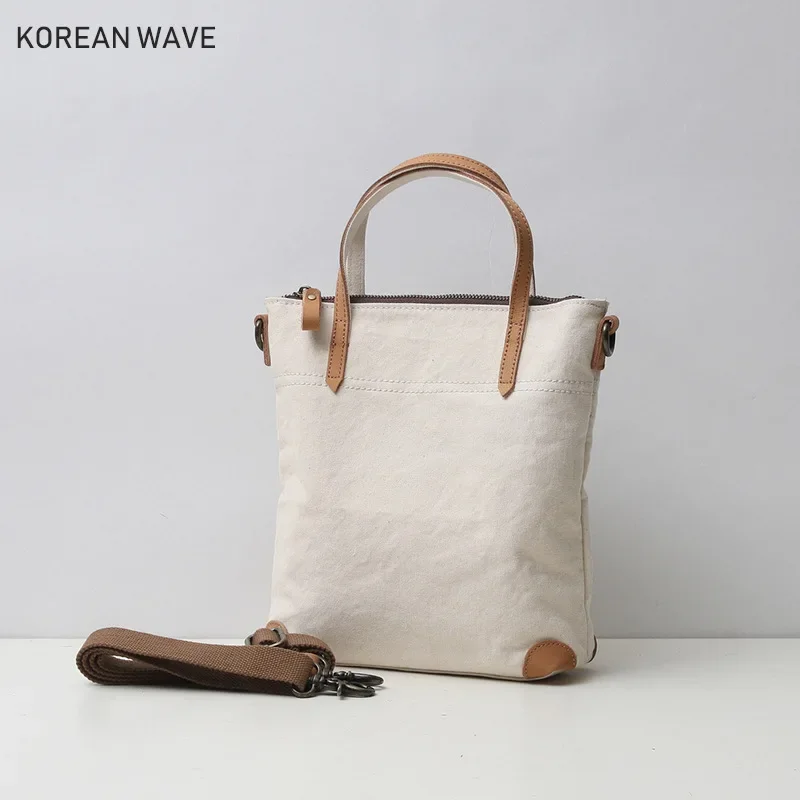 Korean version ins canvas women's bag shoulder bag Mori solid color hand carrying bucket bag fairy bag solid color hand carrying