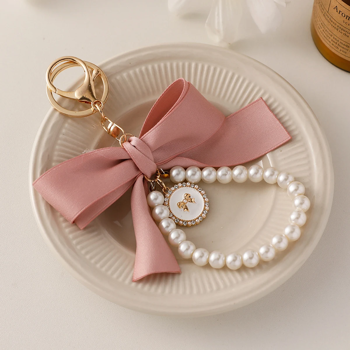 1pcs new large bow pearl key chain pendant creative colorful ribbon cloth knot accessories headset kit accessories