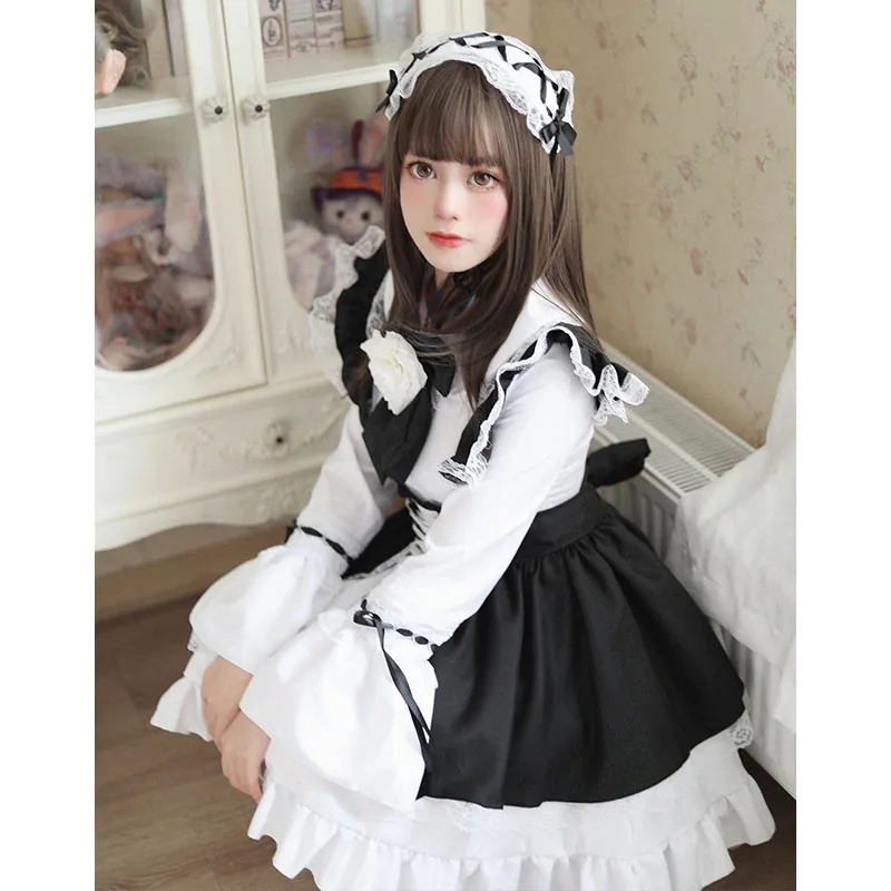 Francuski słodki styl Lolita kostium śliczne Kawaii Maid ubrania sukienka Vintage z długim rękawem Cosplay słodkie styl japoński czarno-białe