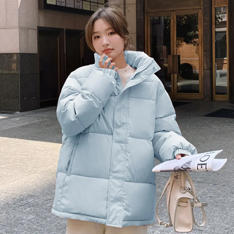 سترة نسائية شتوية عصرية بسحّاب وياقة واقفة وأكمام طويلة سترة نسائية بجيوب بلون سادة مع قلنسوة سترات نسائية