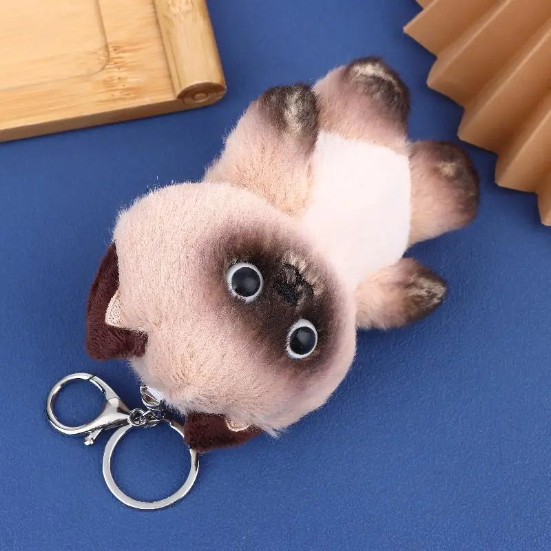 Muñeca con colgante de gato siamés realista única, llavero de gatito de peluche suave, 1 pieza, cara marrón y blanca, recuerdo de fiesta, decoración linda para el hogar
