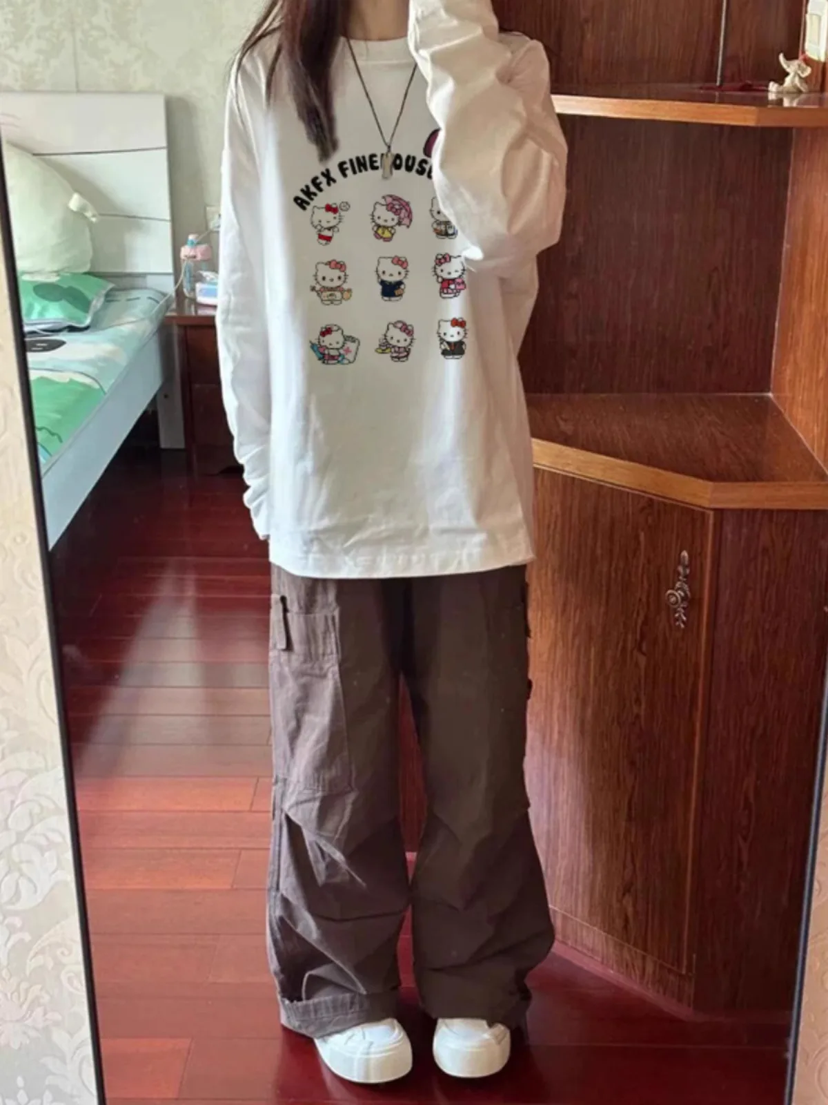 Süßes, langes Sve-T-Shirt aus reiner Baumwolle mit Kit-Print, vielseitiges, lockeres, schlankmachendes, lässiges, mittellanges Oberteil