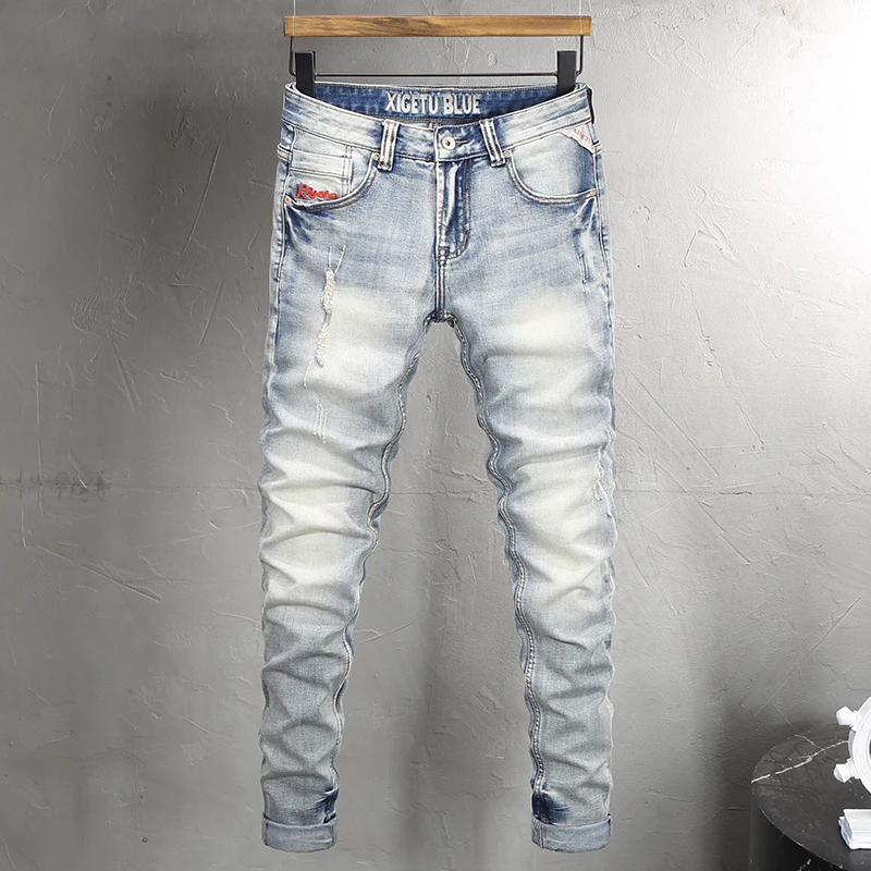 

Street fashion men's jeans elastic slim fit ripple scratch embroidery light blue jeans men's designer hip-hop denim pants hombre