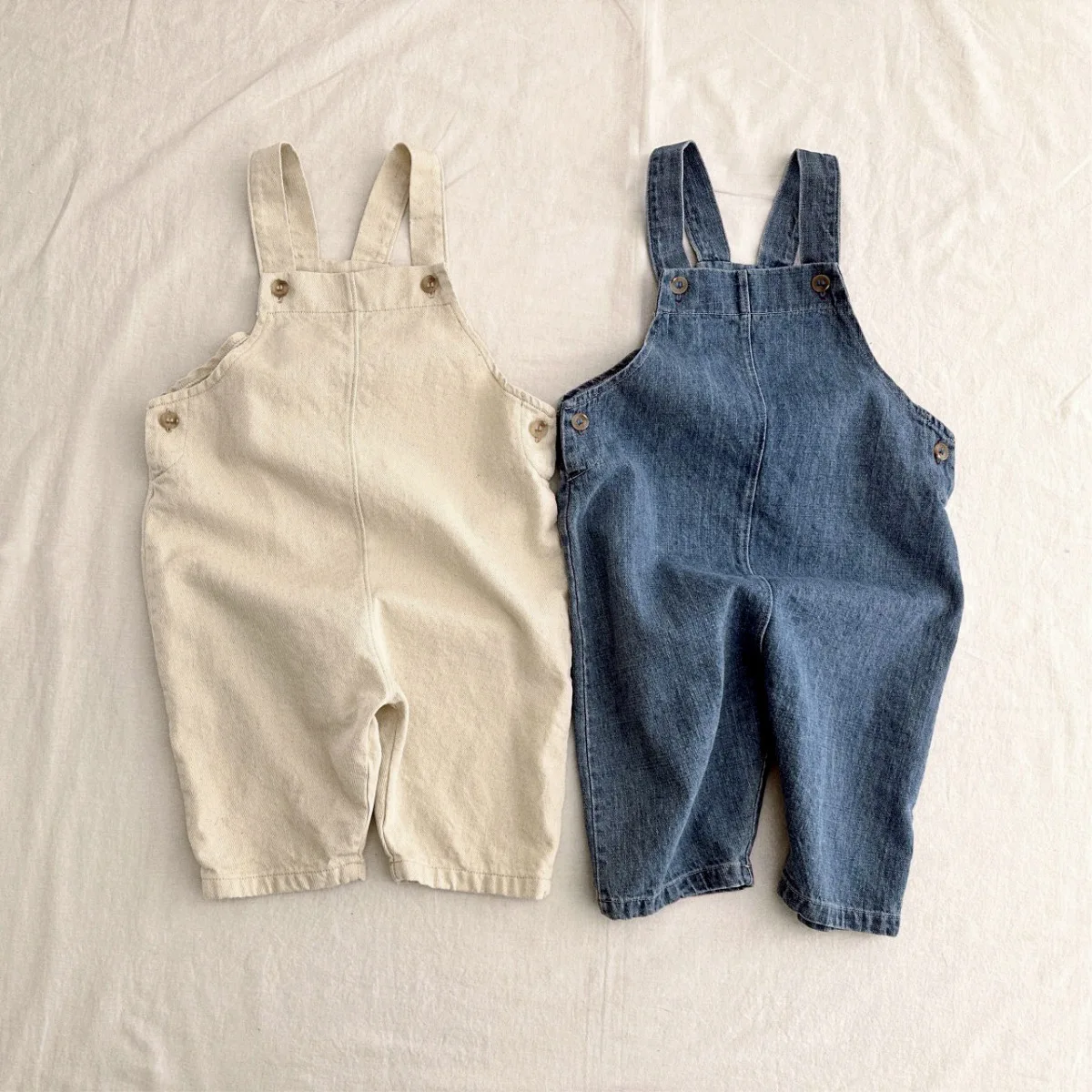 2026 Spring New Baby Loose Denim Overalls Solid Boys Loose Jumpsuit Fashion Infant Girls Strap Trousers Toddler Casual Jeans