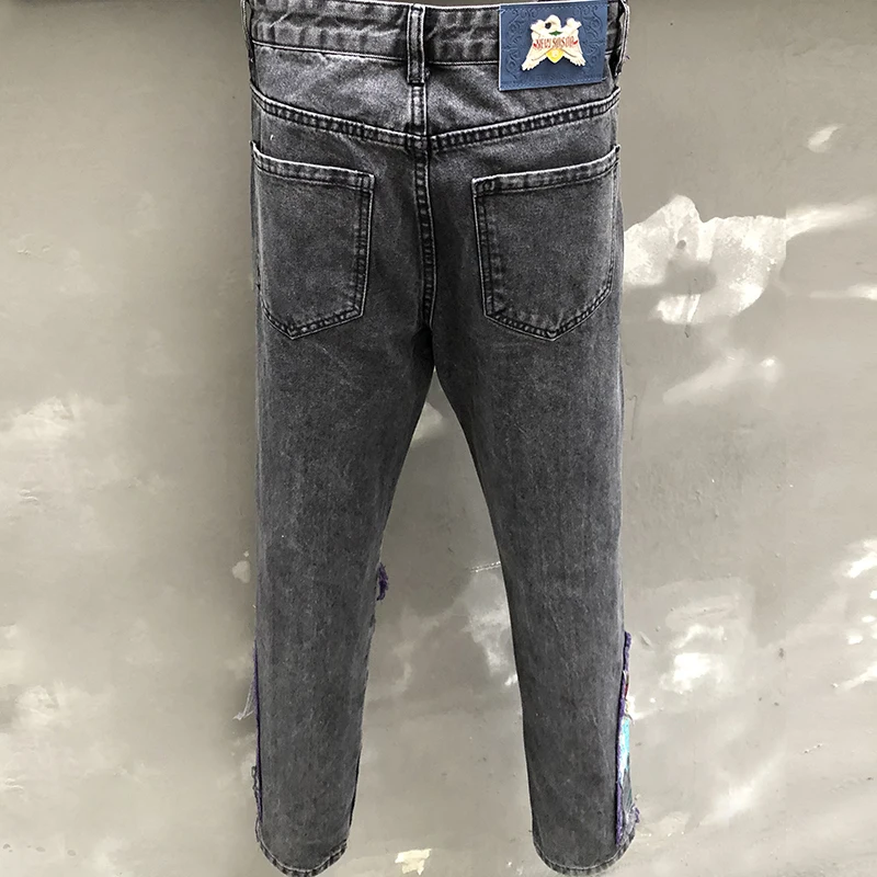 Jeans slim fit ricamati con toppa a foro Pantaloni streetwear Hip Hop Punk Jean Jeans elastici da uomo per pantaloni da moto