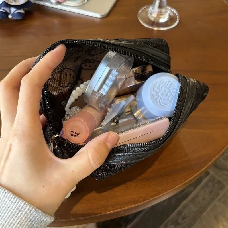 Neue Sanrio Hello Kitty Mesh-Material Kosmetik Aufbewahrungstasche Kreative tragbare Handtasche mit hoher Kapazität und Reißverschluss Niedliches Mädchenzubehör