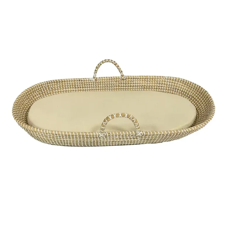 Hand-woven seaweed baby changing basket with nursery mattress