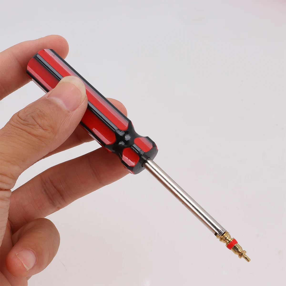 

1 комплект, инструмент для установки и снятия сердечника с пластиковой ручкой, прочный инструмент для ремонта с одной головкой для велосипеда, мотоцикла, средство для удаления сердечника