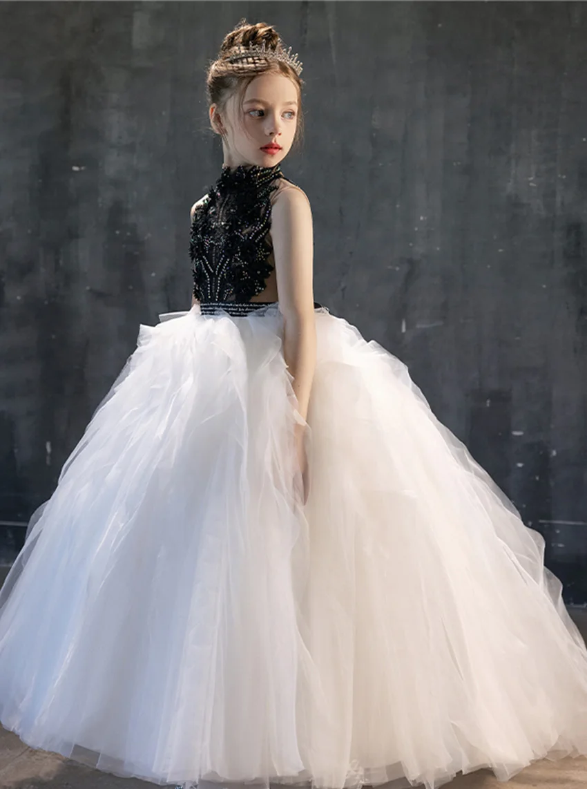 สาวเชือกแขวนคอคอสีดําและสีขาวคอนทราสต์แฟชั่นชุดวัยรุ่นที่งดงามสาวแต่งตัวคอนเสิร์ตชุดคอนเสิร์ตขนาดเล็ก/กําหนดเอง