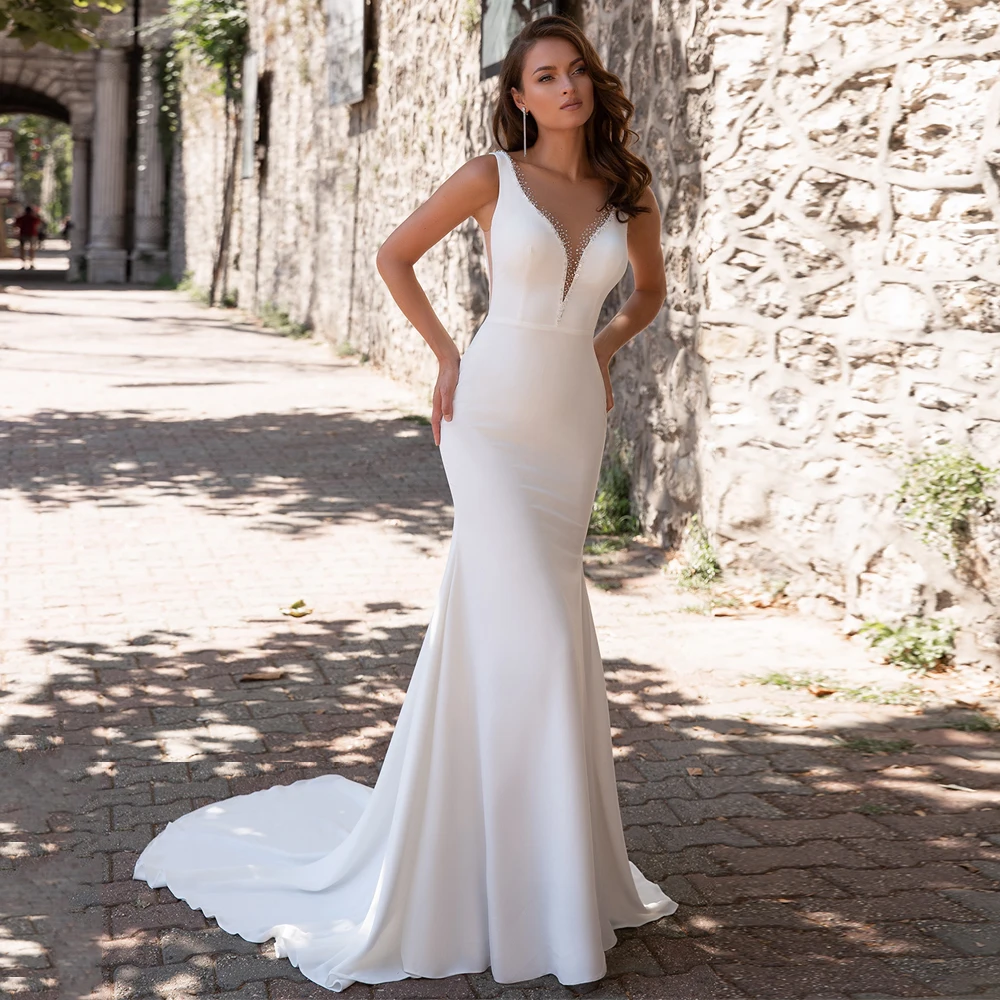 Semplice abito da sposa a sirena Sexy scollo a V senza maniche perline lungo treno in Chiffon Backless abito da sposa abiti da sposa