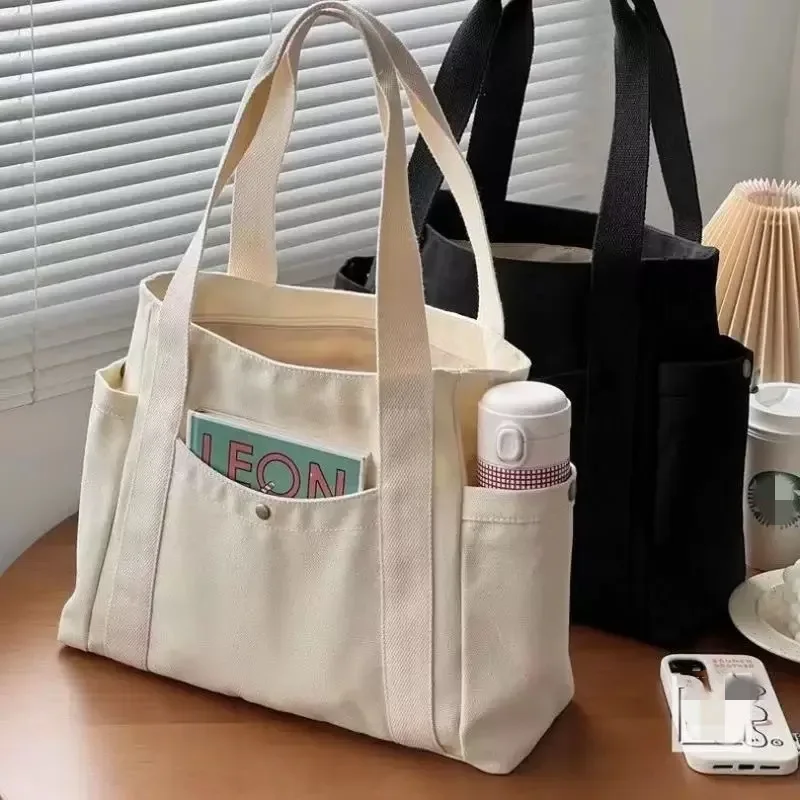 

Large capacity tote canvas bag for work, commuting, high aesthetic value, versatile student book bag, single shoulder cloth bag