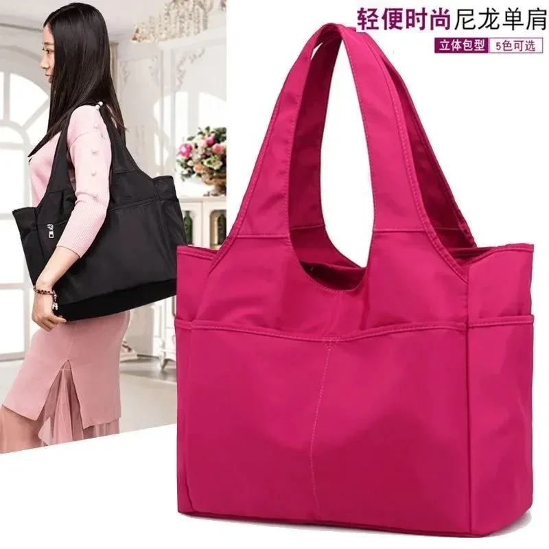 

2024 New Nylon Cloth Women's Lightweight One Shoulder Multi Pocket Handheld Dance Bag Travel Cloth Storage Bag