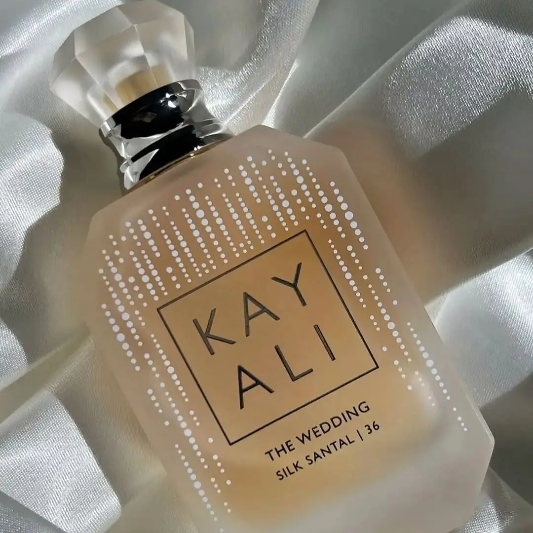 

Парфюм KAYALI Honey-Wrapped Velvet Santal 100 мл The Wedding Silk 36 с шампанскими пузырьками