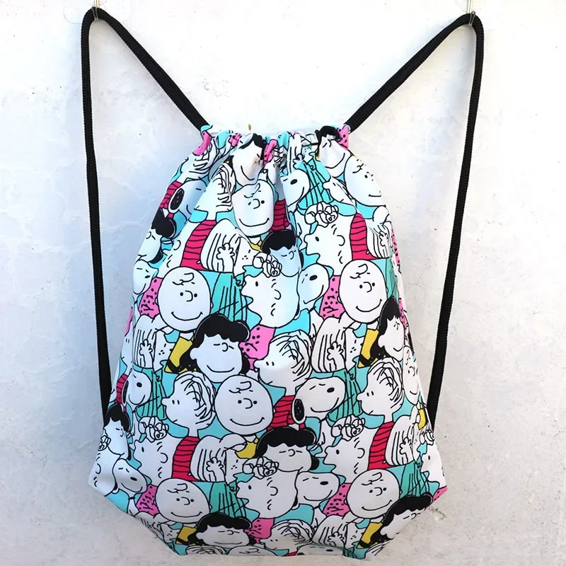 Snoopy Canvas zaino con coulisse Travel Fashion School Gym borsa con coulisse Anime Cartoon Casual String zaino sportivo zaino