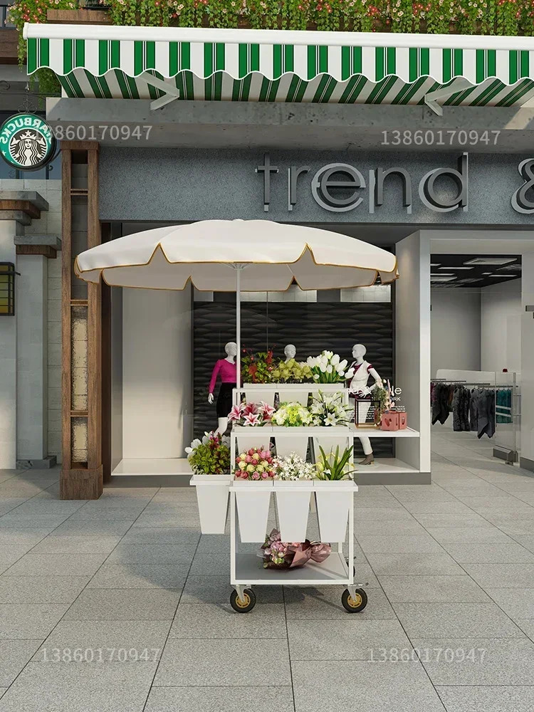 Street vendors selling flower carts, night markets, outdoor flower shop supplies, flower bouquets, folded multiple layers