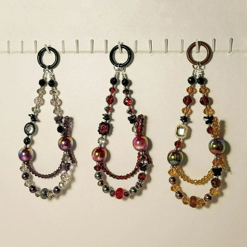 

Autumn And Winter Dark Streamer Cat Eye Beads Mobile Phone Case Lanyard Trendy Girl Versatile Crystal Car Key Bag Pendant